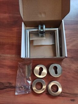 Prodám nerezové dveřní kování