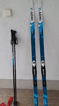 Dětské běžky INOVIK, 139 cm (30–39 kg), šupiny, včetně hůlek