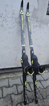 Závodní dětské běžky Fischer Twin Skin Race + boty Fischer