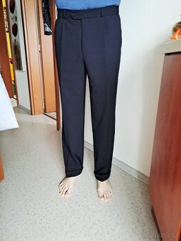 Pánské společenské kalhoty, velikost L, zn. Koutný