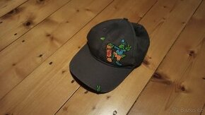 Kšiltovka dinosaurus