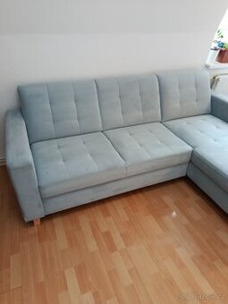 Moderní rohová rozkládací sedačka s úložným prostorem