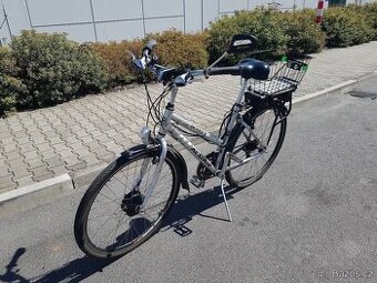 Dámské elektrokolo s košíkem na nákupy