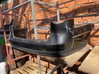 Zadní nárazník černý VW Passat B6