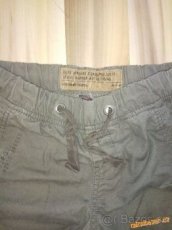 Značkové kalhoty Next