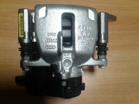 Brzdový třmen zadní - NOVÝ originál Audi včetně brzdových de