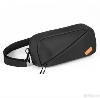 Prodám nepoužitý cestovní batoh na Handheld