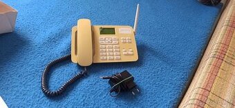 Sarý přenosný telefon
