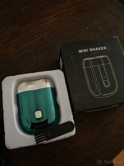PŘENOSNÝ HOLICÍ STROJEK MINI BRZYTELKA NA VOUSY PÁNSKÁ USB