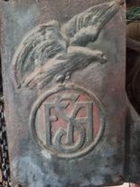 Stará litinová pásová pila