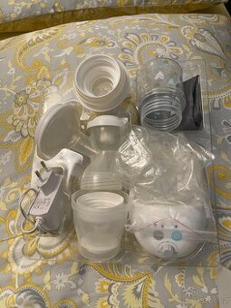 Elektrická odsávačka a skleněná láhev Dr Brown