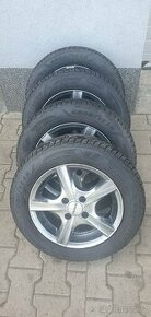 Zimní pneu Goodyear + disky 175/65 R14 (Renault Thalia)