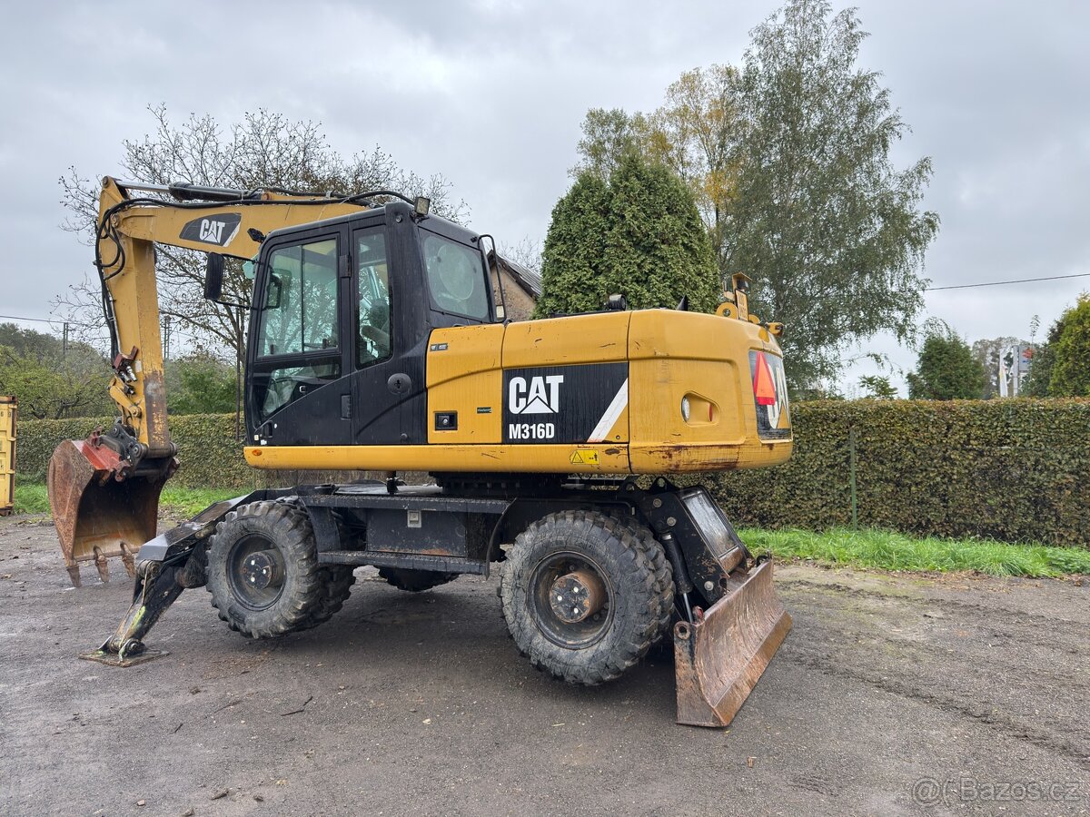 Kolový rypadlo Caterpillar M316D - 2