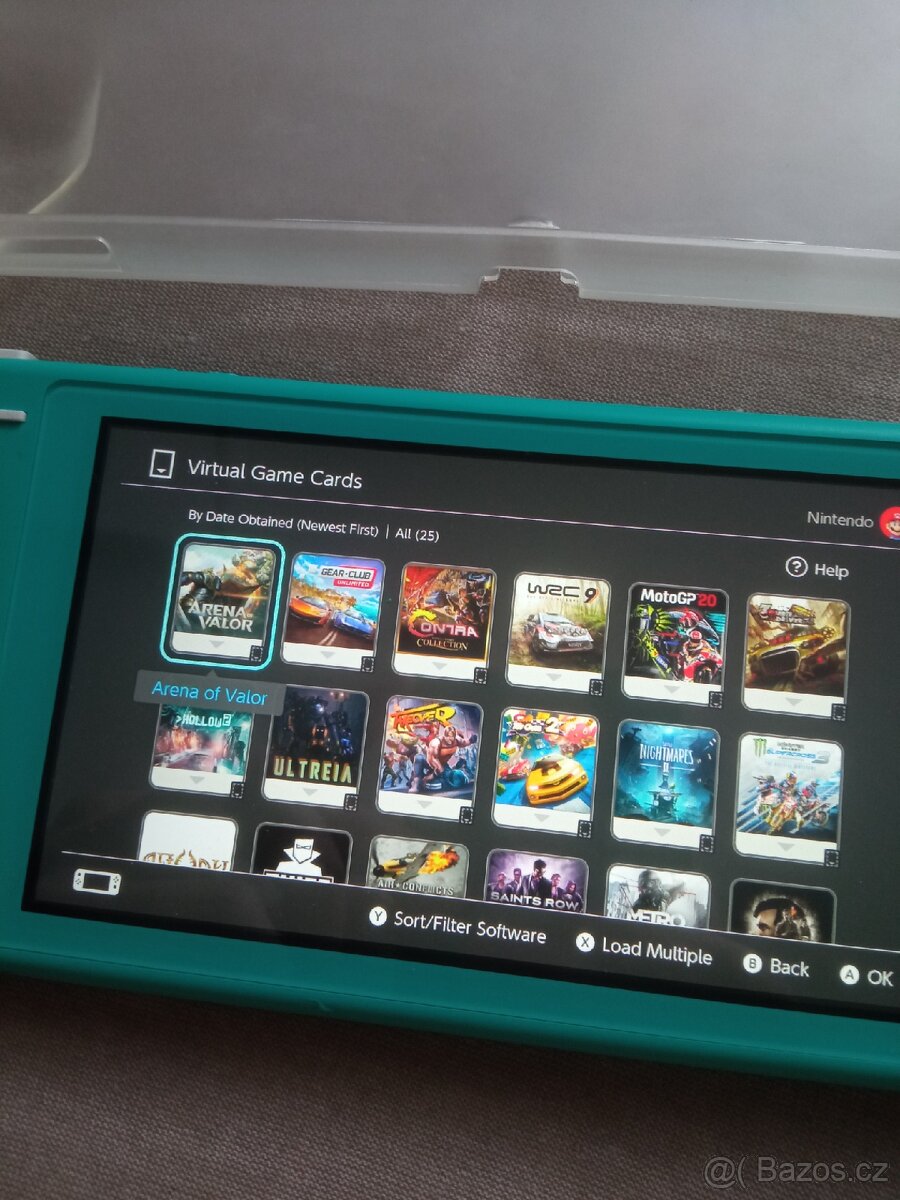 Nintendo switch lite plus můj účet 21 hrama - 2