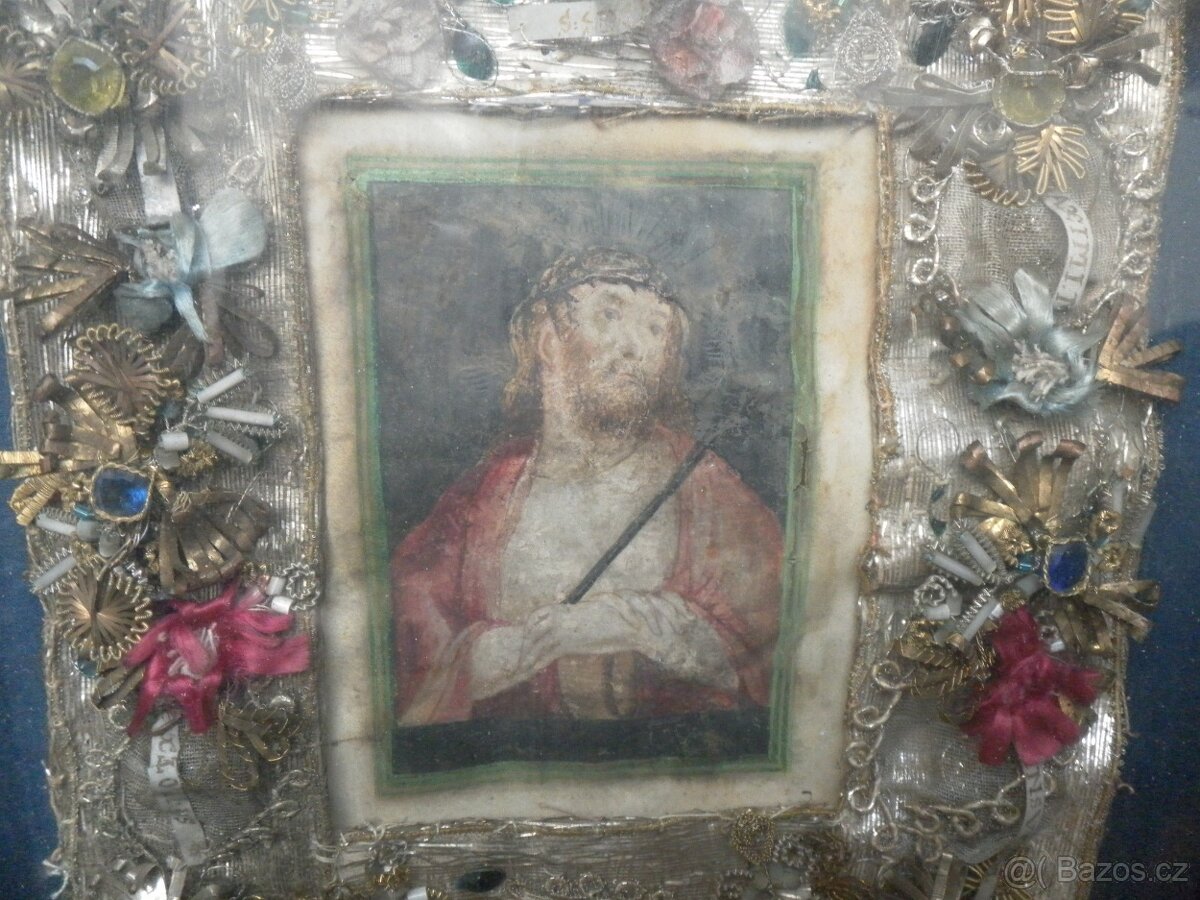 Sv. obrázek s ostatky - datováno 1673. - 2