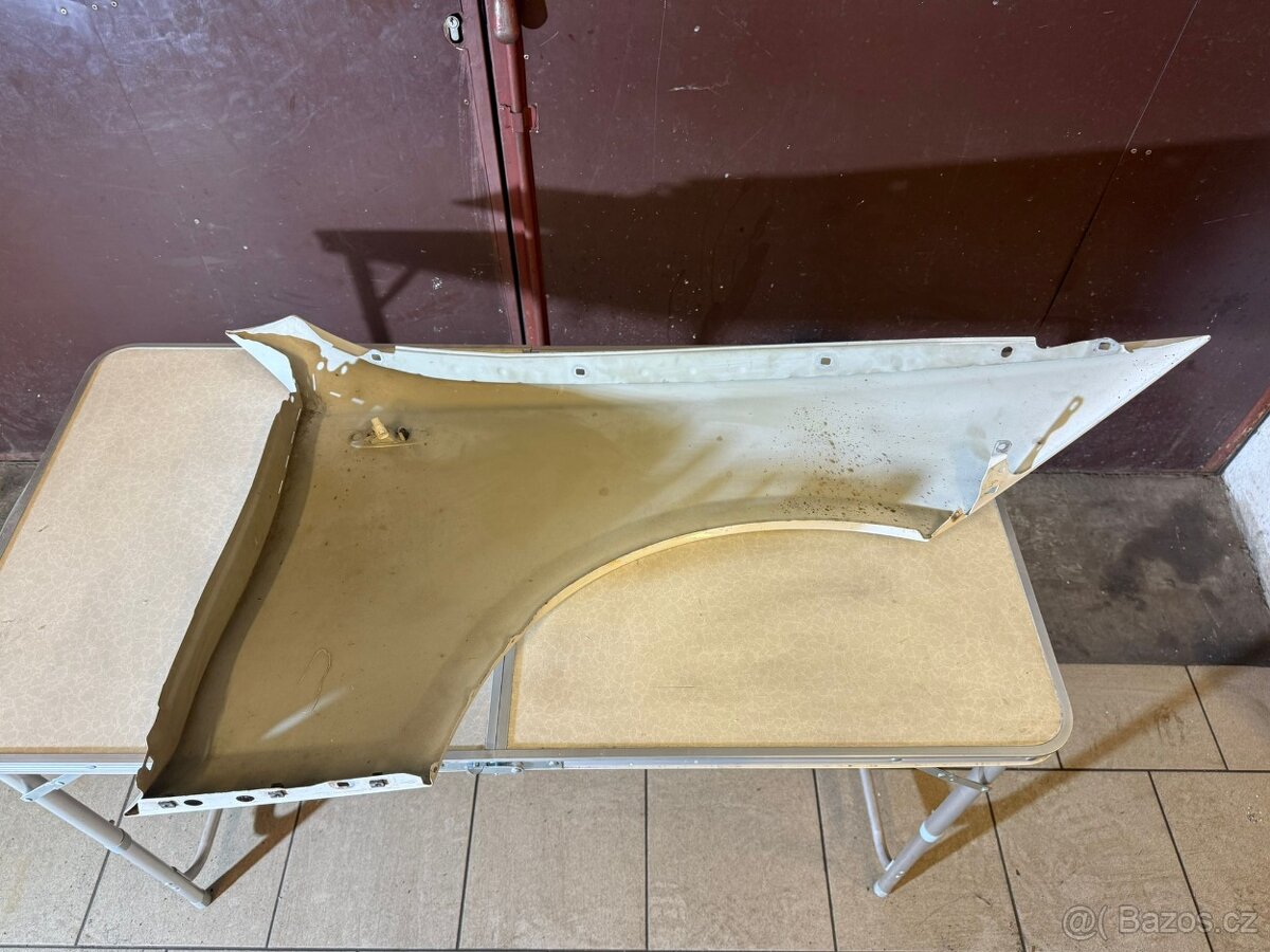 L blatník BMW E87 - 2