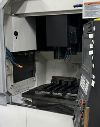 Obráběcí centra - pětiosá Genos 560 - 2