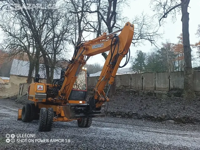 kolový bagr Liebherr A310 - 2