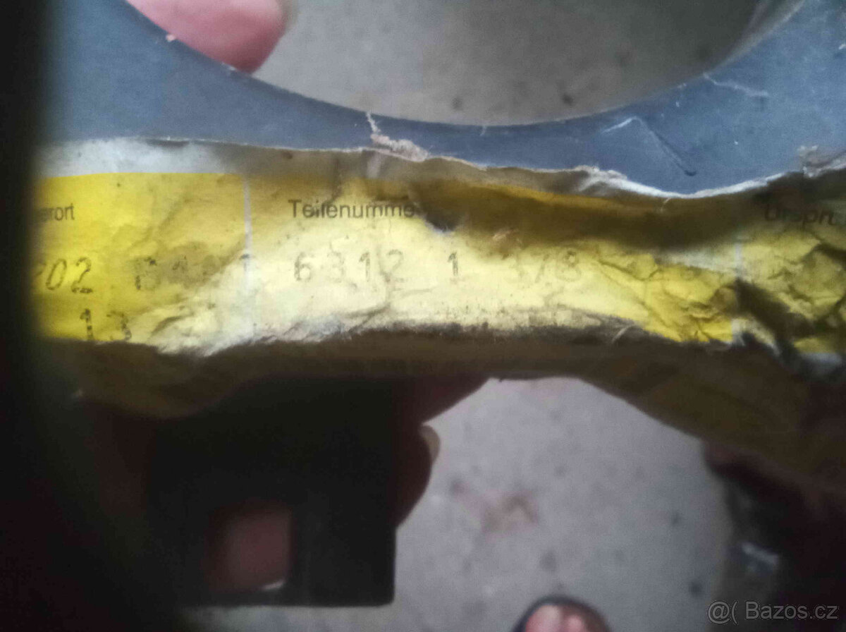 L držák světla OE BMW E34, E32 - 2