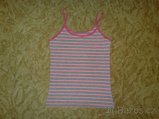 Prodám 2 dívčí tílka vel.140 - 2