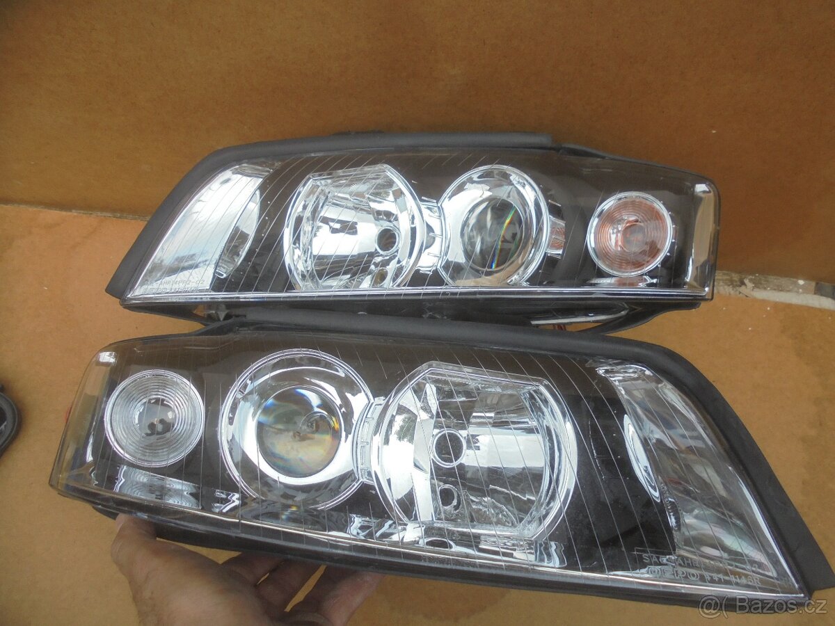 AUDI A4 ,8E - přední čirá optika XENON D1S - 2