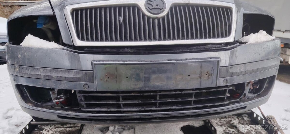 prodám přední nárazník na Škodu Octavii 2 před FL - 2