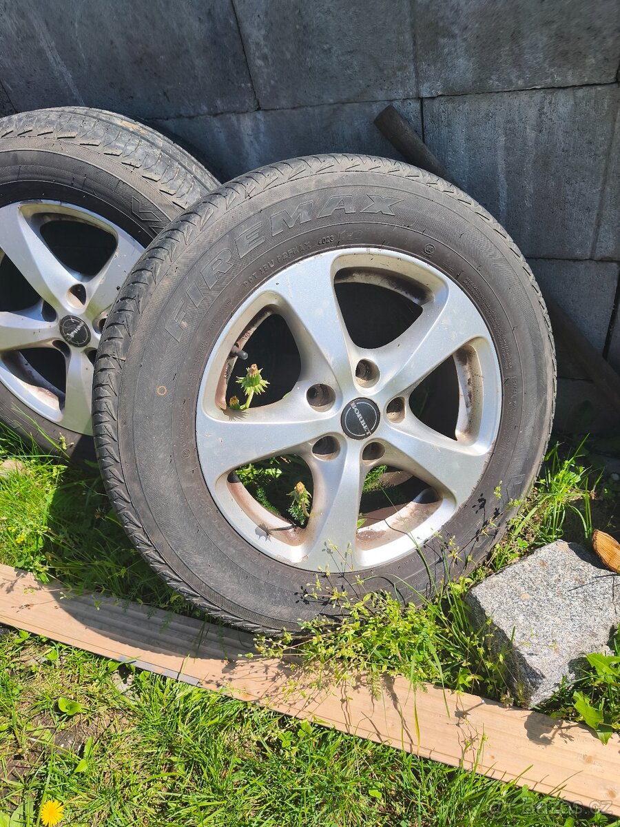 ALU kola s pneu 4x / 16 - 2