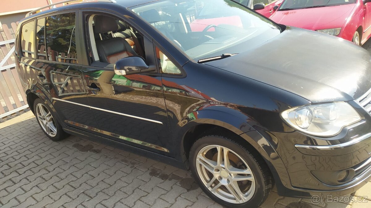 Touran 2.0tdi 7 mist - 2