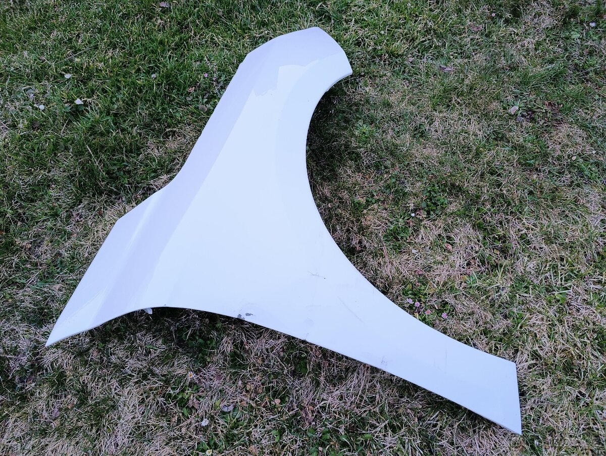 Opel Corsa F PP blatník. - 2