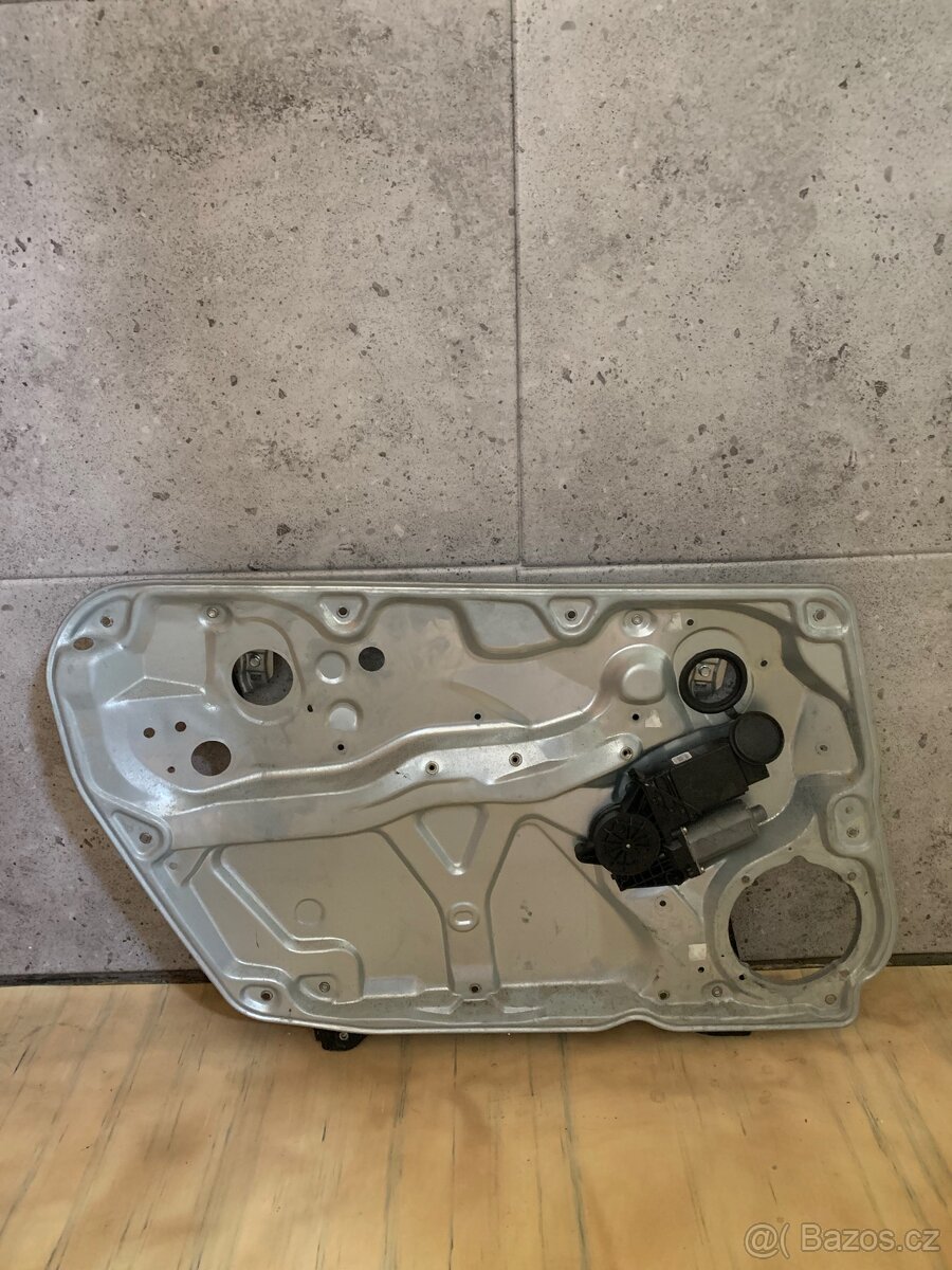 Levá přední stahovačka včetně elektromotoru VW Passat B5,5 - 2