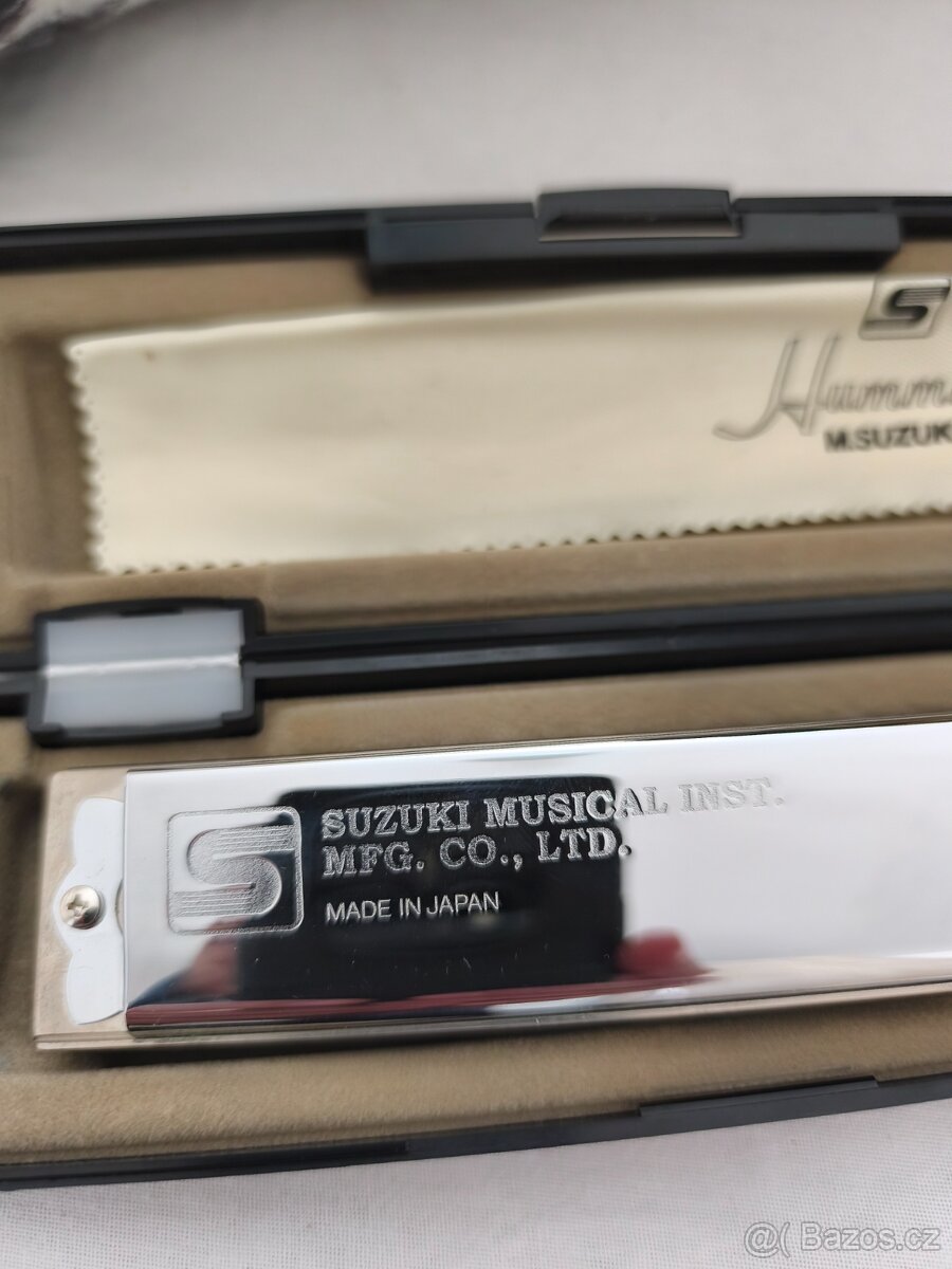 Foukací harmonika. - 2