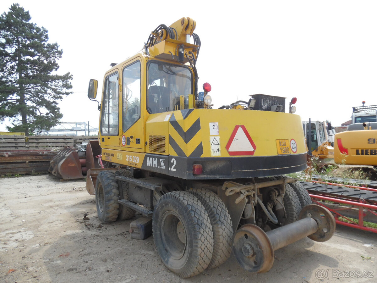 Kolové rýpadlo - NEW HOLLAND - 2