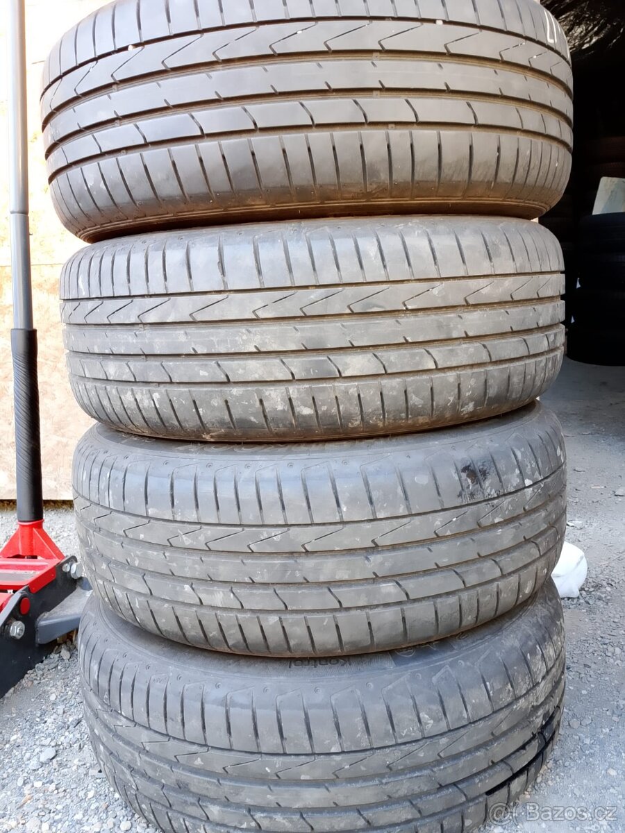 Originál ALU BMW 7x16 ET52+letní 205/60/16 RFT Hankook - 2