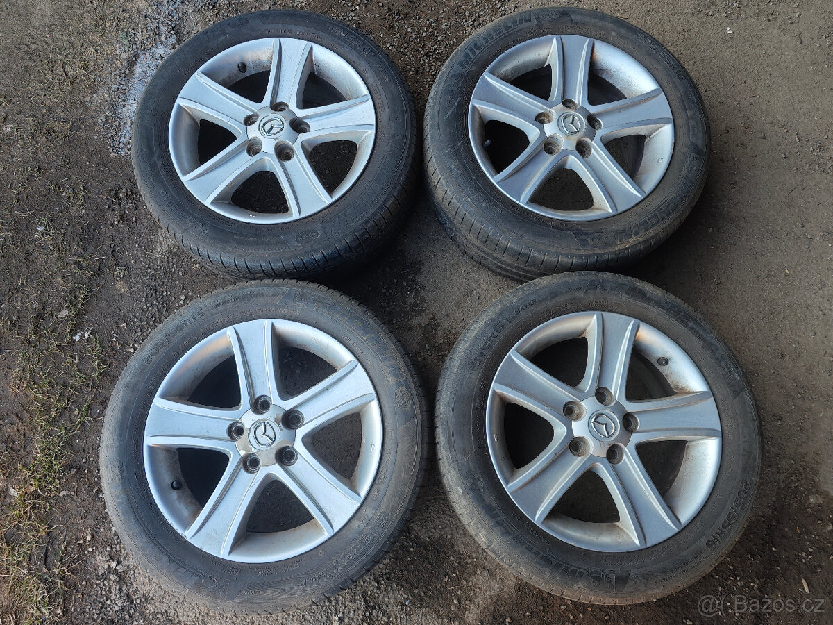 Prodám sadu Alu disků Mazda 7Jx16H2 ET55 + le pneu 205/55/16 - 2