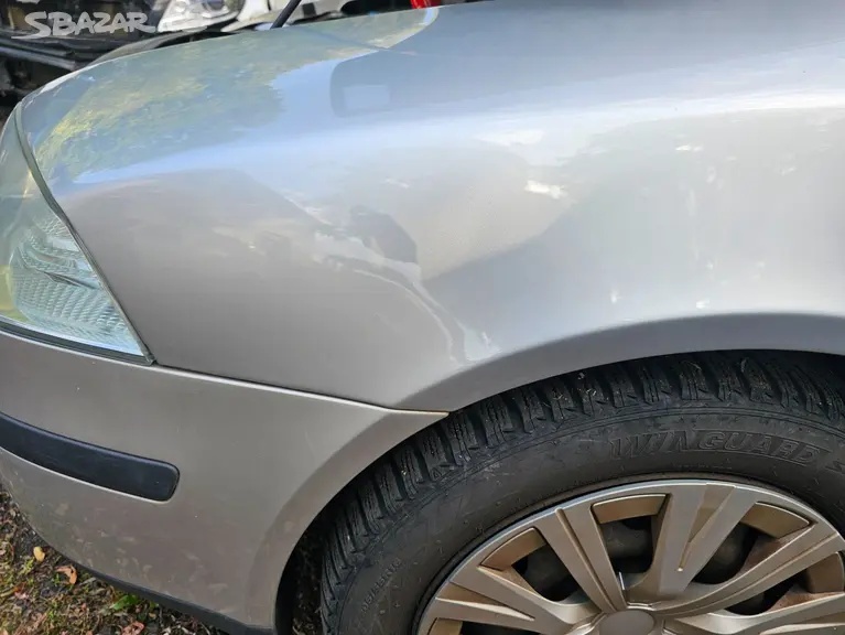 Levý přední blatník Škoda Octavia 2 před fl - 2