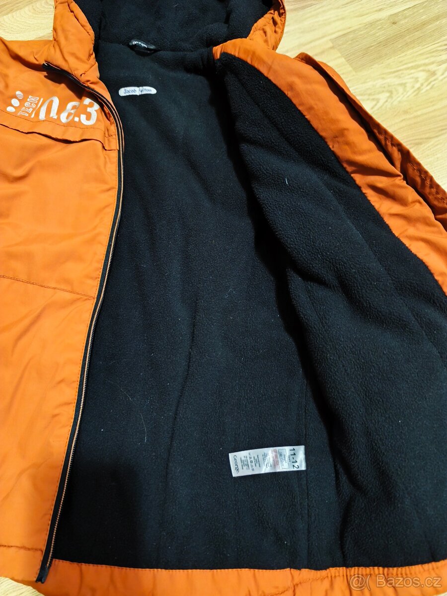 Zimní oranžová bunda vel. 11-12 let - 2