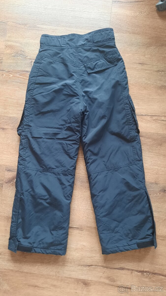 Vyleteplené kalhoty Okay vel.128. - 2