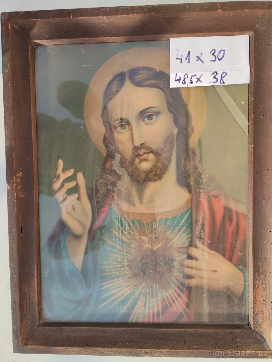 Staré obrazy v dřevěném rámu . - 2