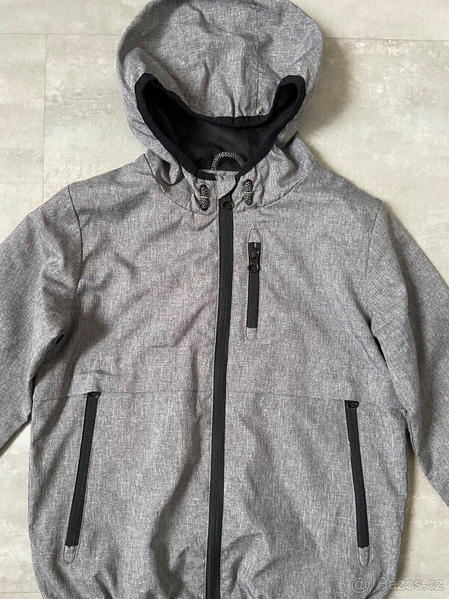 Šedá bunda vel.6-7let - 2