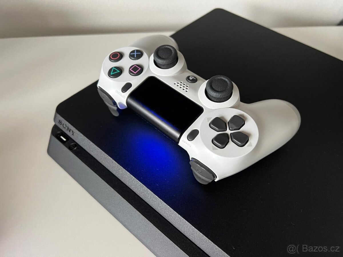 Playstation 4 Slim 1TB + Uncharted - 2