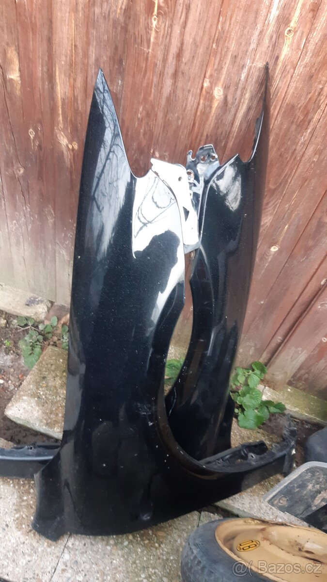 mazda cx7 - zadní blatníky - 2