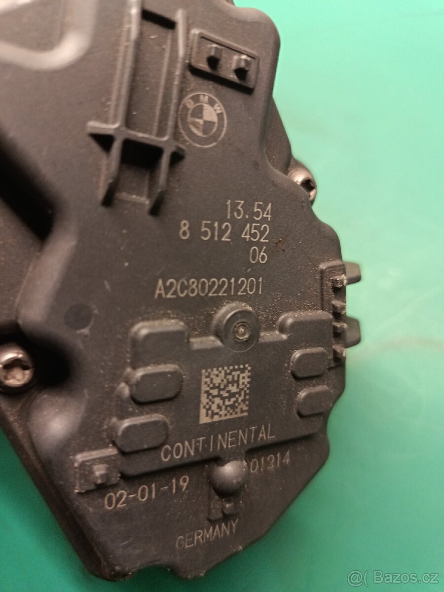 Škrtící klapka BMW 13548512452 - 2