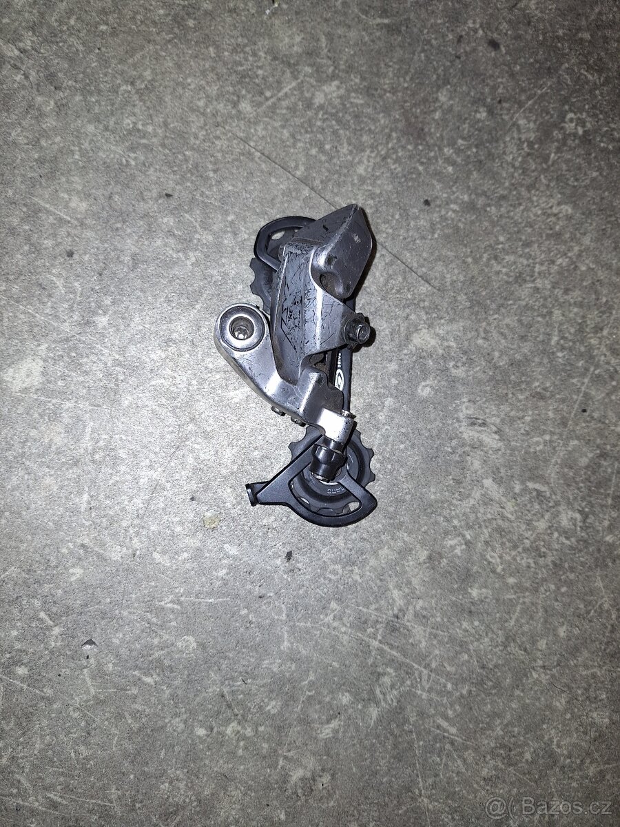 Devitirychlostni prehazovacka Shimano LX RD-M570 - 2