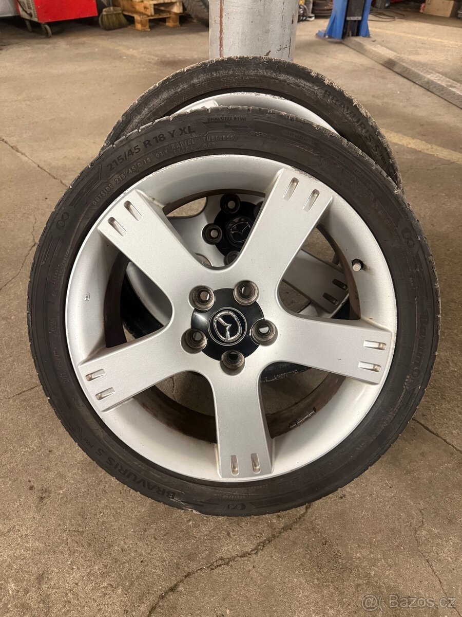 Alu kola Mazda 215/45R18 - 2