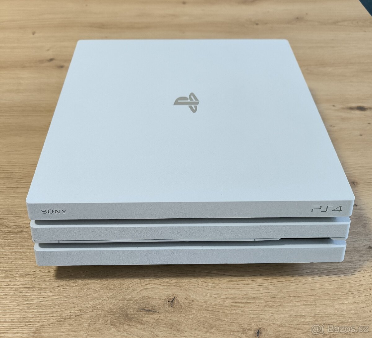 Prodám PS4 Pro 1TB Glacier White + 2x ovladač + hry - 2