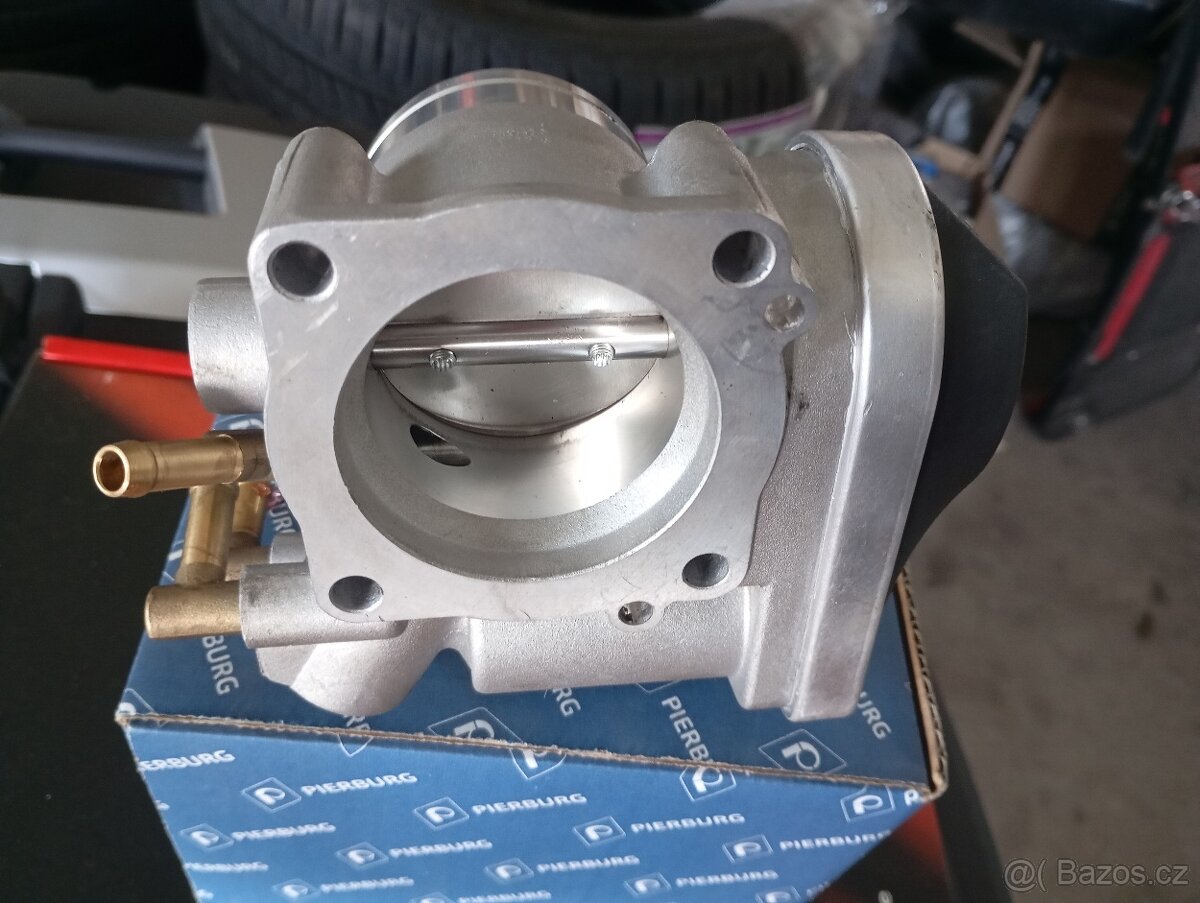 Škrtící klapka VW 1.6MPI 75KW - 2