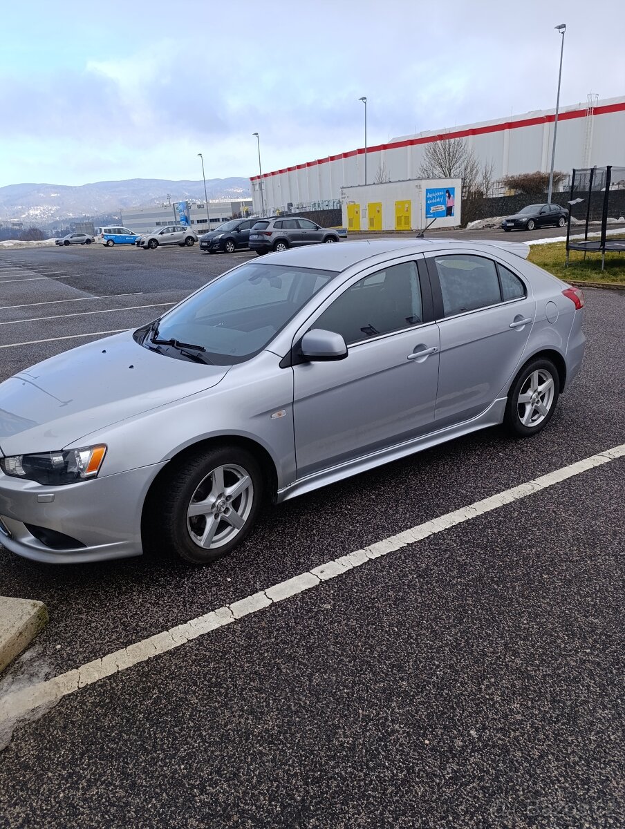 Mitsubishi Lancer 1,8,105kw,144000km,2010 - 2