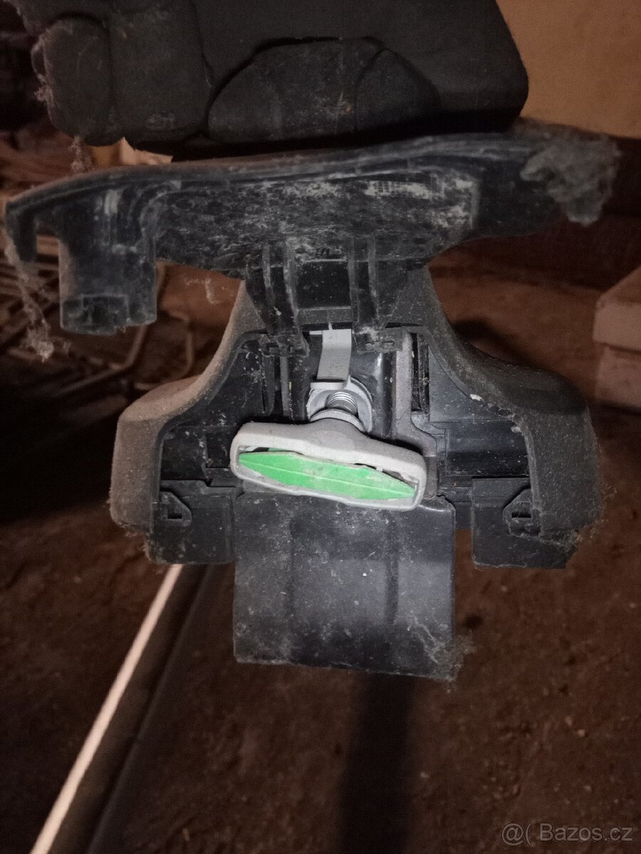 Příčníky Thule Rapid System - na auto bez hagusů. - 2