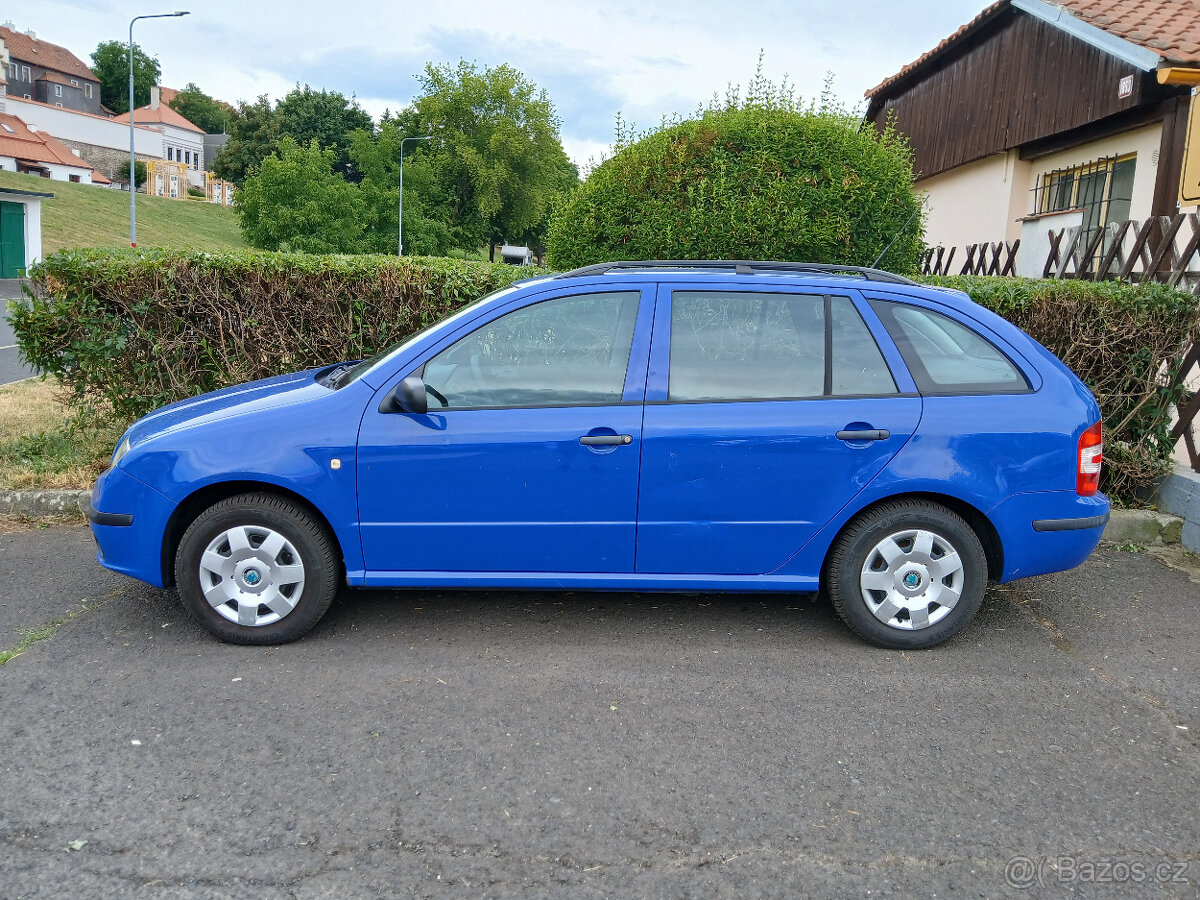 Škoda Fabia Com 1.4 59kW serviska - 2