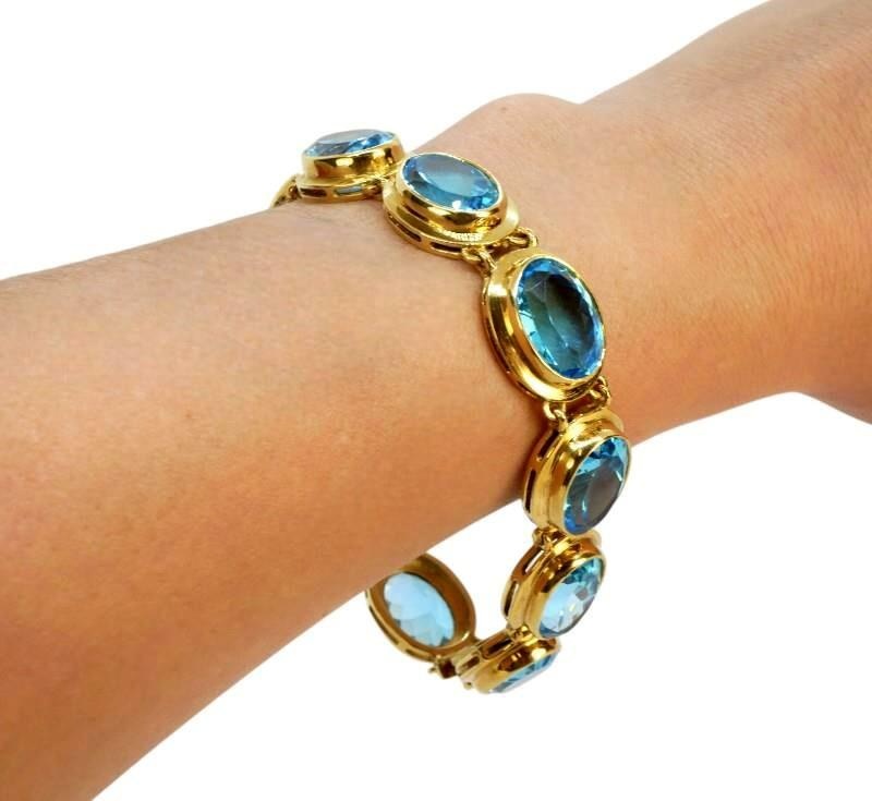 Zlatá souprava s modrými topazy 750/000 () - 2